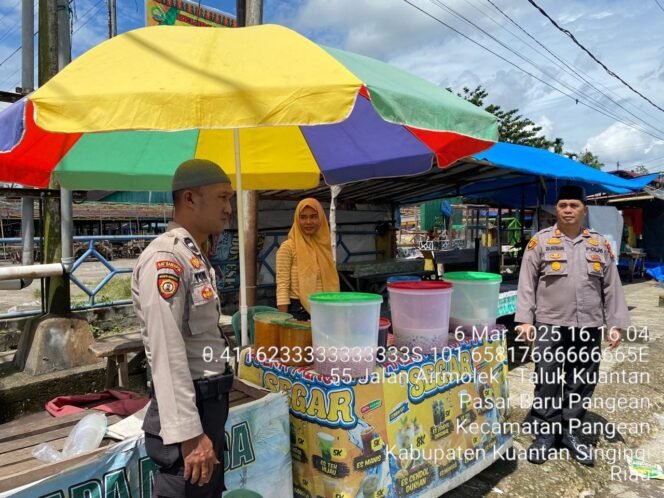 
					Polsek Pangean Tebar Jaring Pengamanan, Jaga Harmoni Pasar Ramadhan Tetap Tertib dan Kondusif.