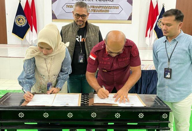 
					Perkuat Layanan Keuangan, Lapas Pekanbaru Gandeng BRI Lancang Kuning melalui MoU.