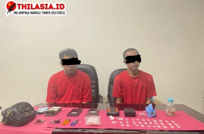 
					Dua Pengedar Dibekuk di Gubuk Desa, Polres Rohul Sita 32 Paket Sabu dan Ganja.
