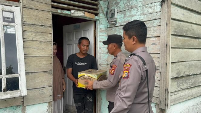 
					Polsek Singingi Tebar Kepedulian, Warga Air Emas Sambut Hangat Minggu Kasih.