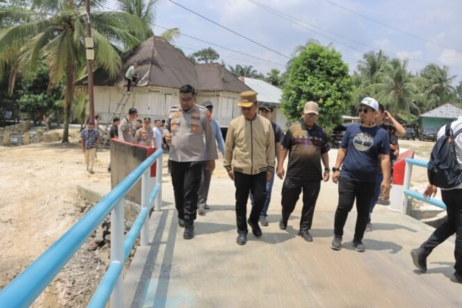 
					Kapolres Kampar Dampingi Bupati Kampar Cek Kesiapan Jembatan Merah Putih Presisi Menuju Peresmian