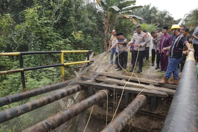 
					Jelang Renovasi Jembatan Merah Putih, Kapolres Kampar Ikuti Doa Bersama di Pulau Jambu